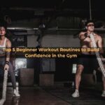 Beginner workout routine Man And Woman Holding Battle Ropes