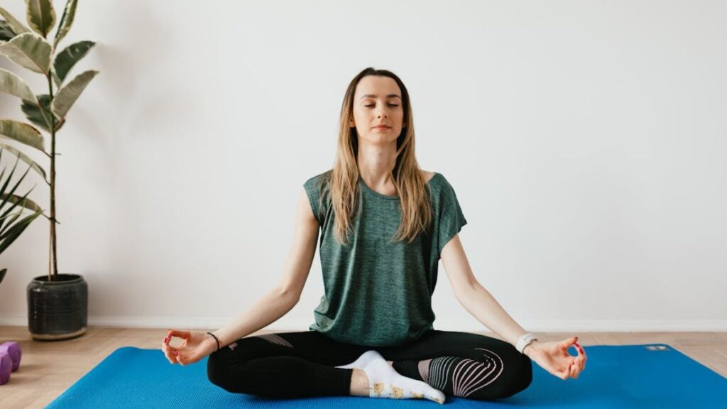 women doing diaphramatic breating exercise to increase oxygen level on her body