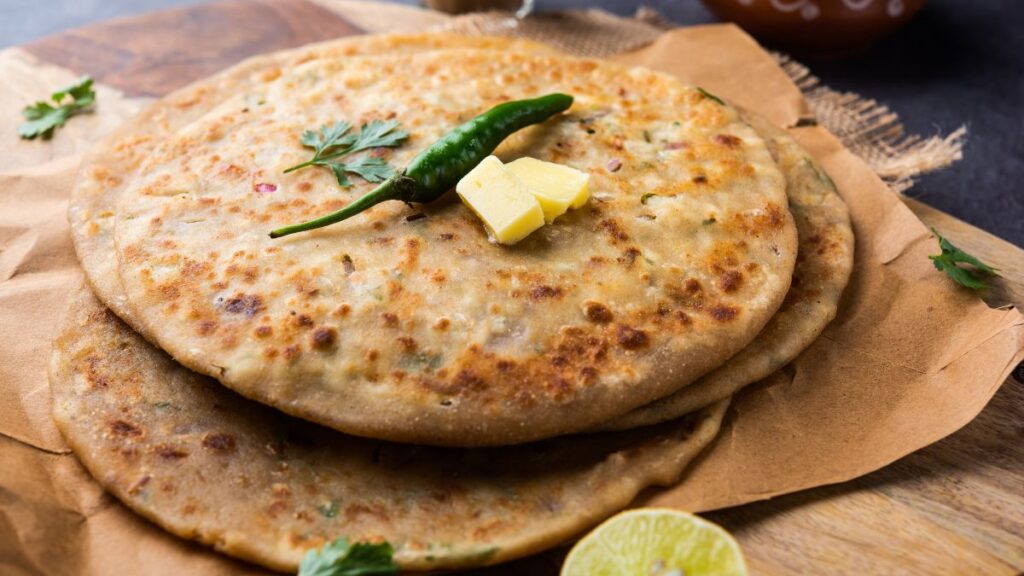 Image of paratha topped with butter, perfect for muscle and weight gain.